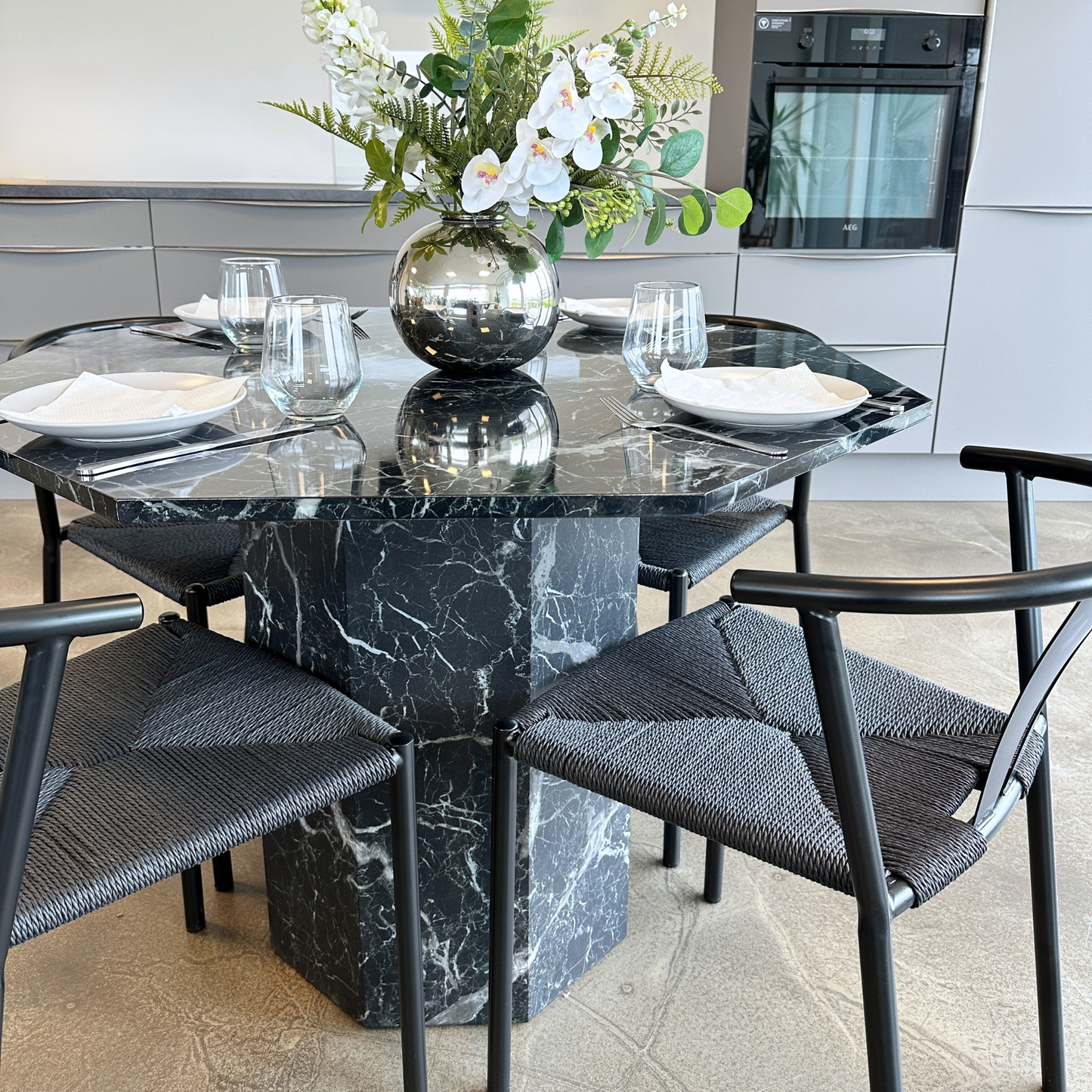 Lagoni - Table ronde Ø100 cm en aspect marbre noir
