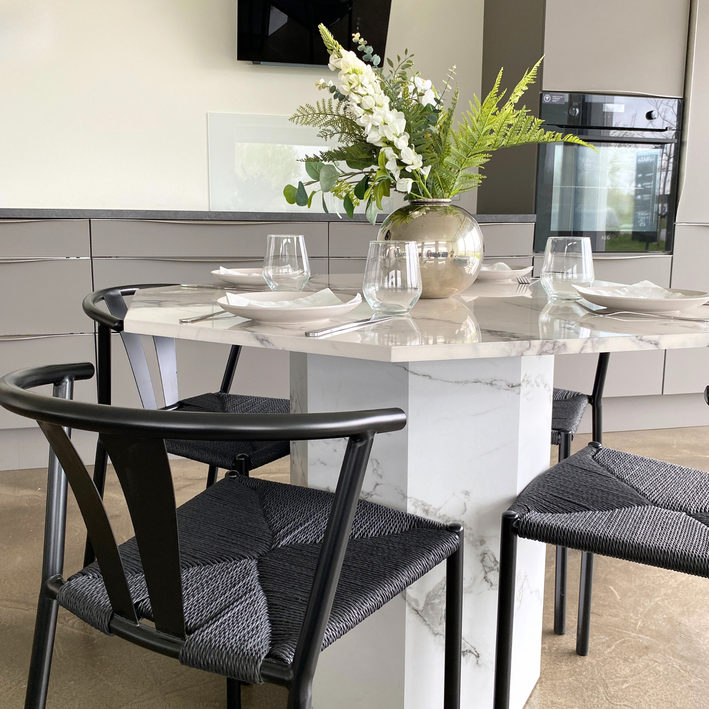 Lagoni - Table ronde de 100 cm de diamètre en aspect marbre blanc