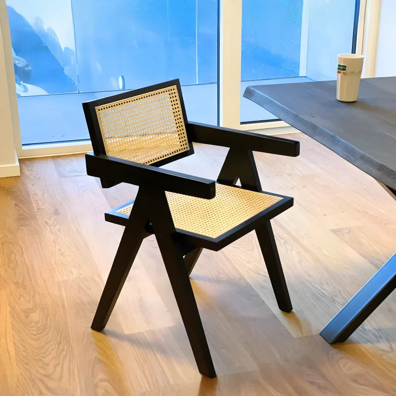 Ava - Chaise de salle à manger avec accoudoirs noire avec assise en rotin