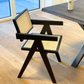 Ava - Chaise de salle à manger avec accoudoirs noire avec assise en rotin